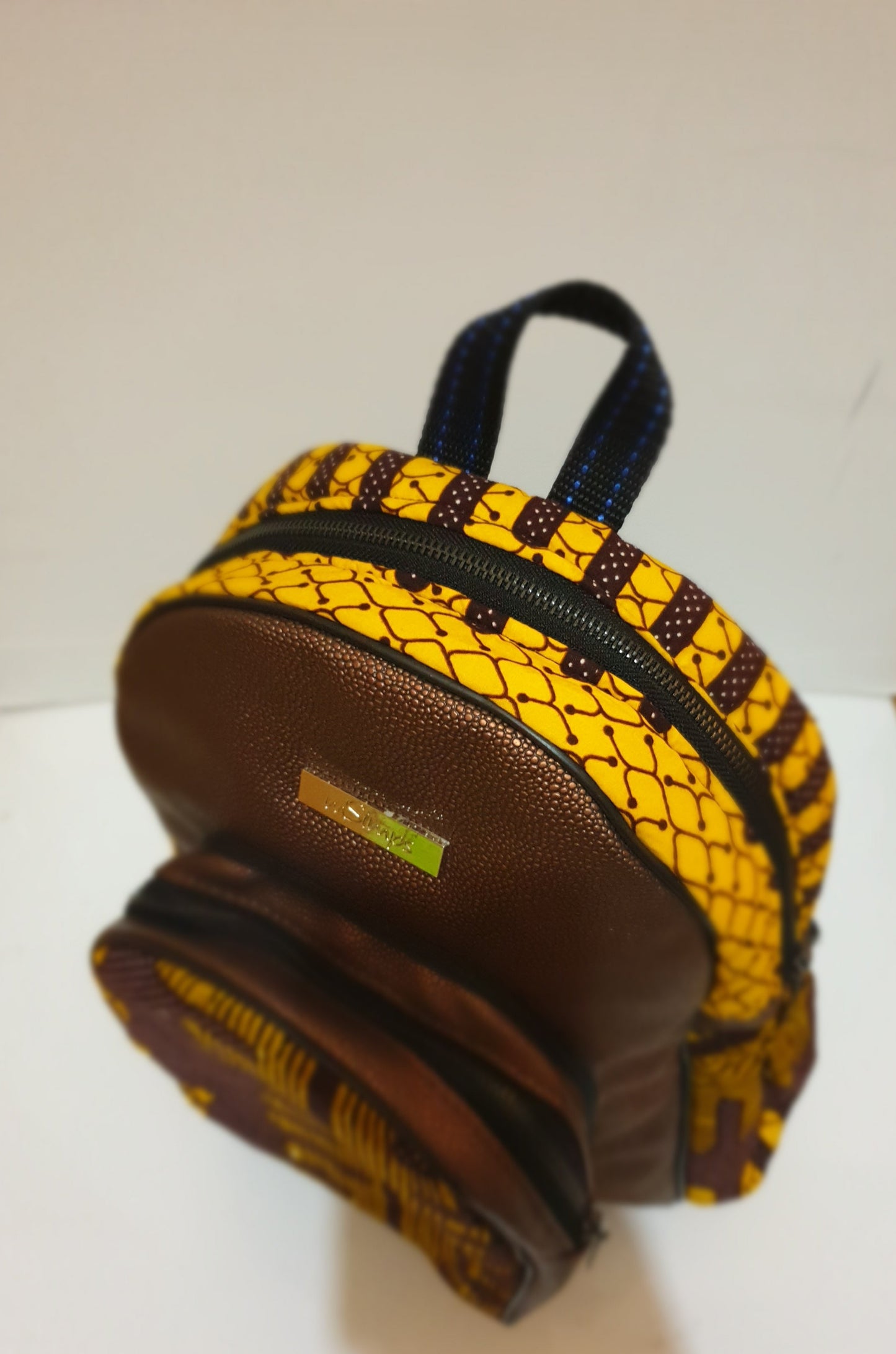 Leather and African print mini backpack - brown metallic