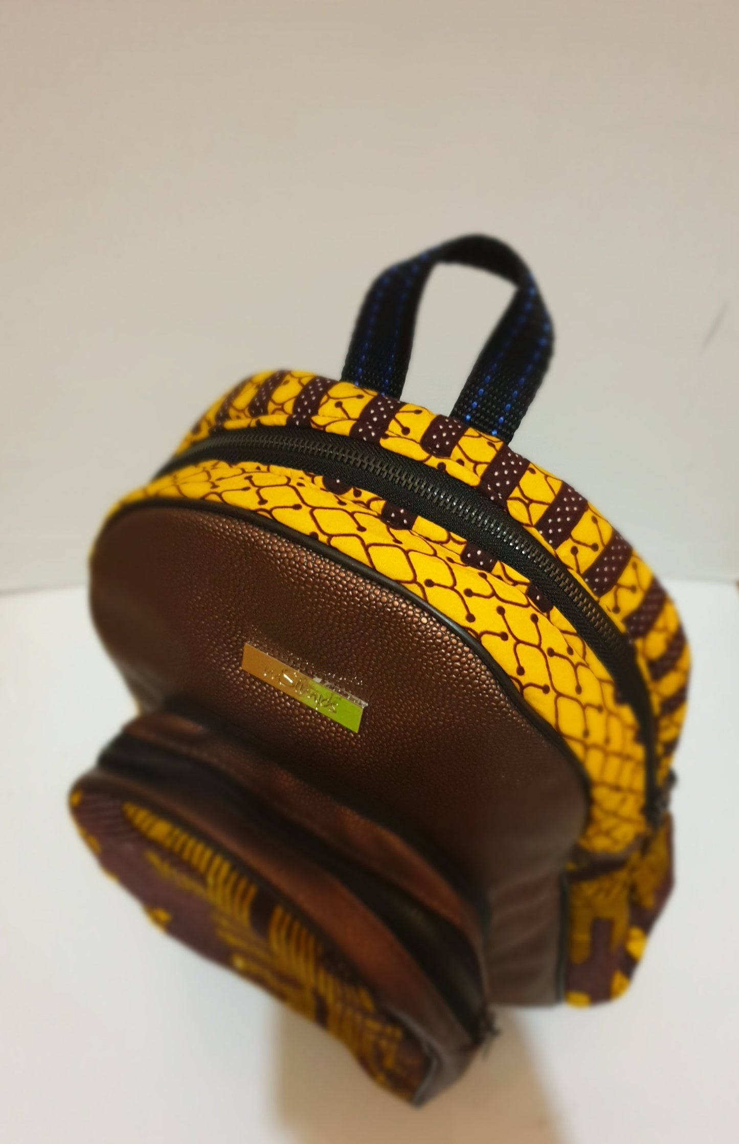 Leather and African print mini backpack - brown metallic