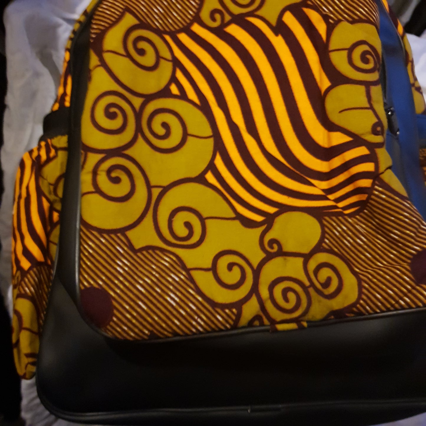 Black handmade Leather and African print backpack