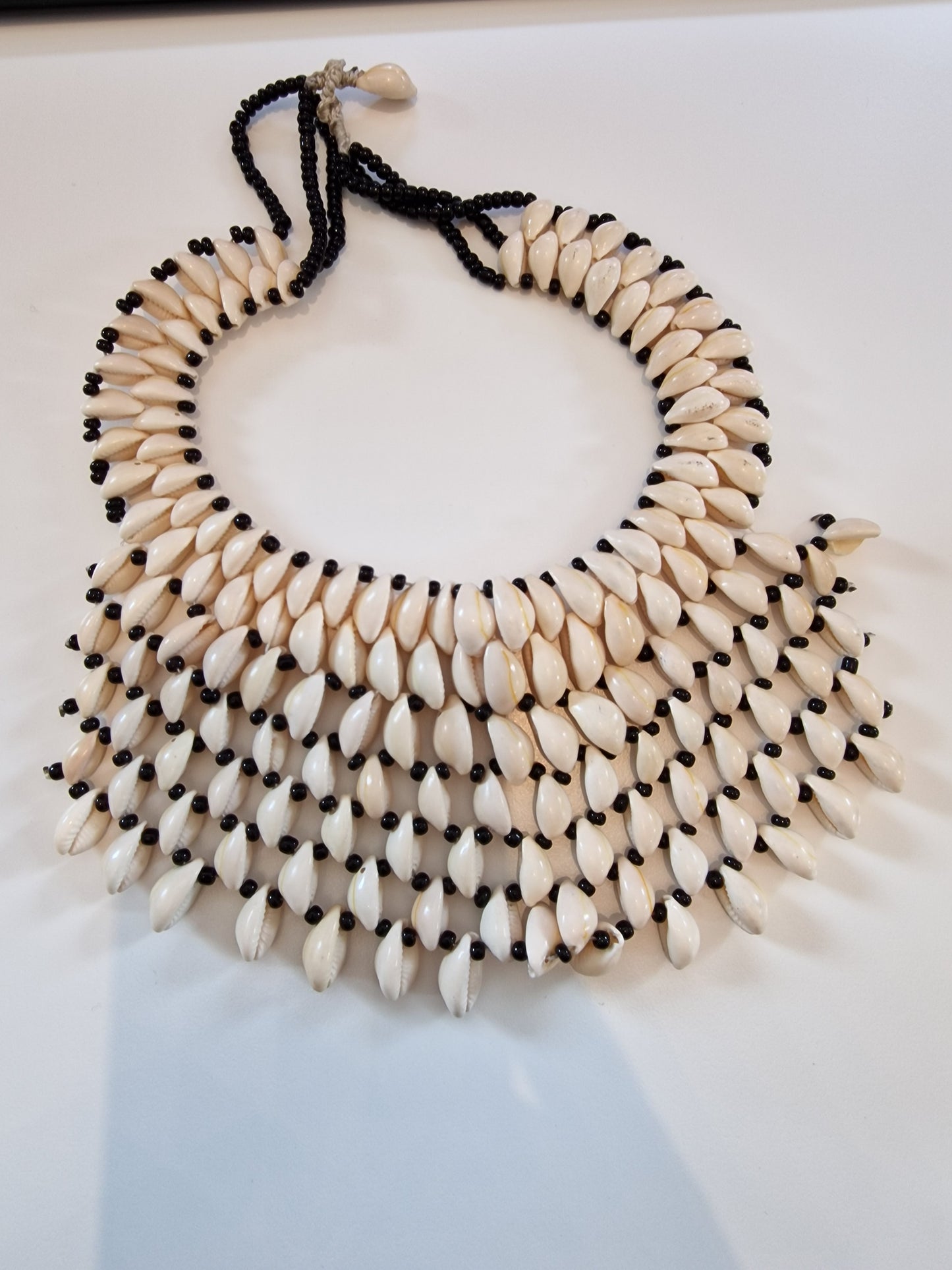 Cowrie bead statement necklace
