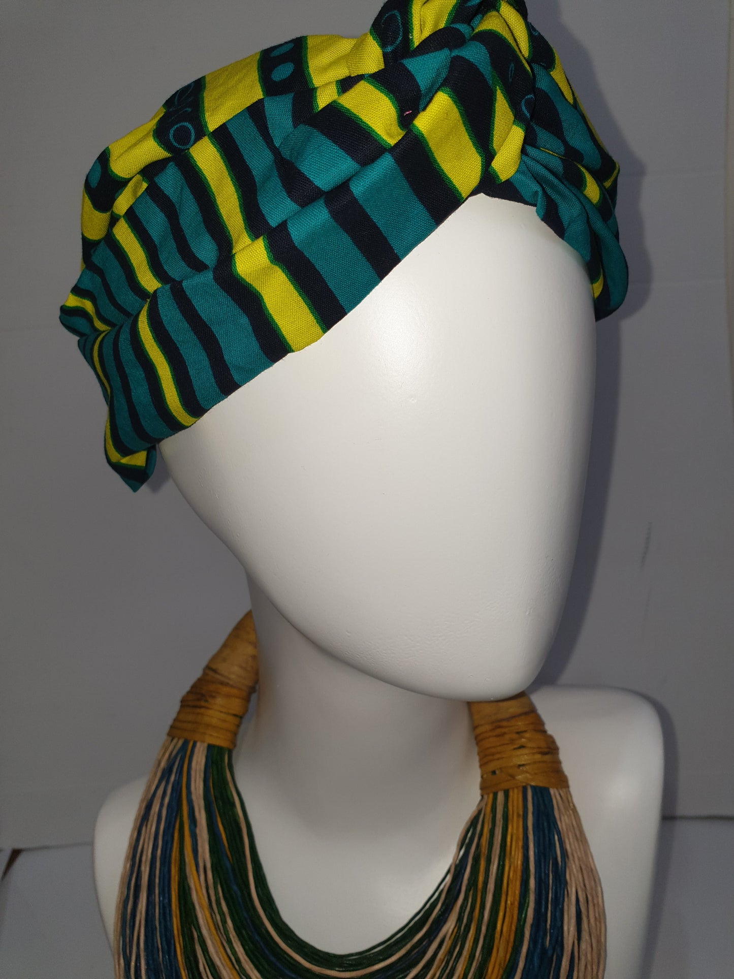 Green and yellow African print turban style headband