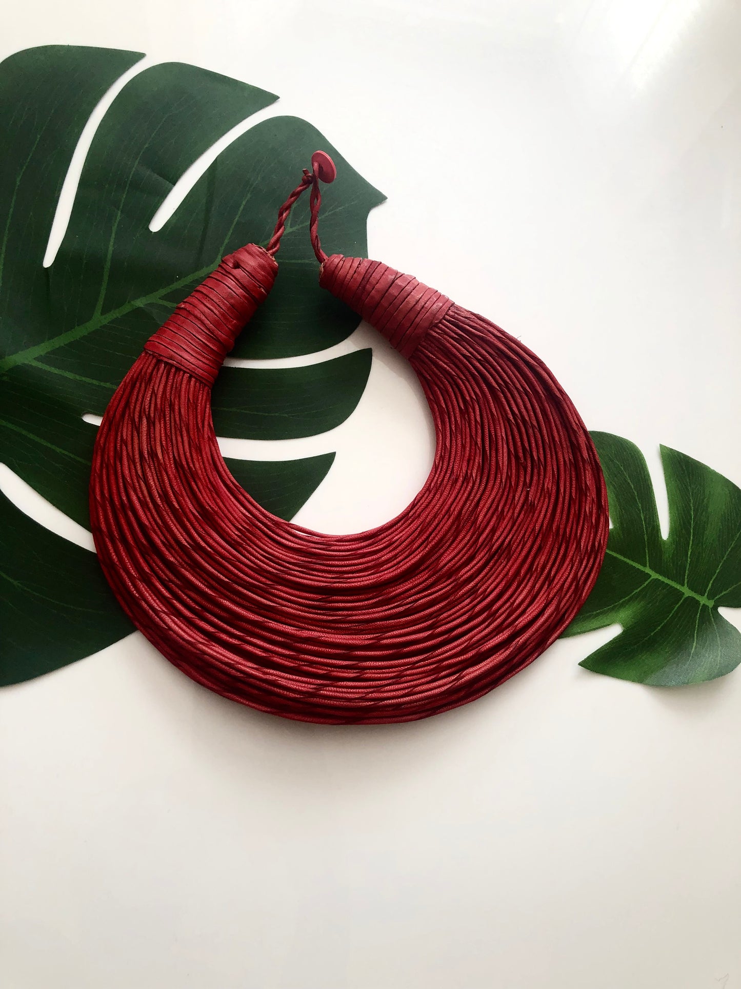 Red leather layered statement necklace