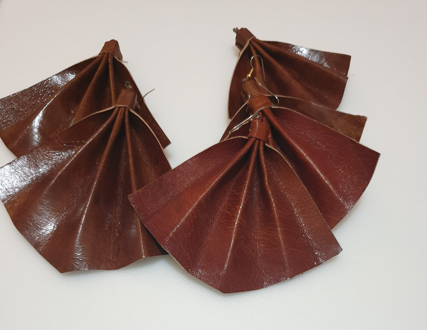 Tan Leather fan shaped statement earrings