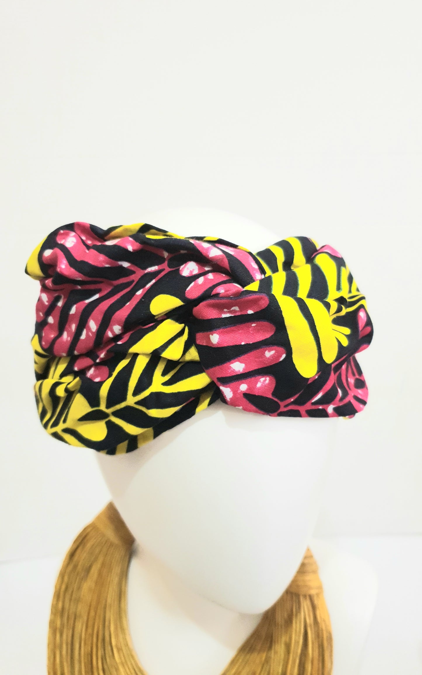 Pink and yellow African print turban style headband