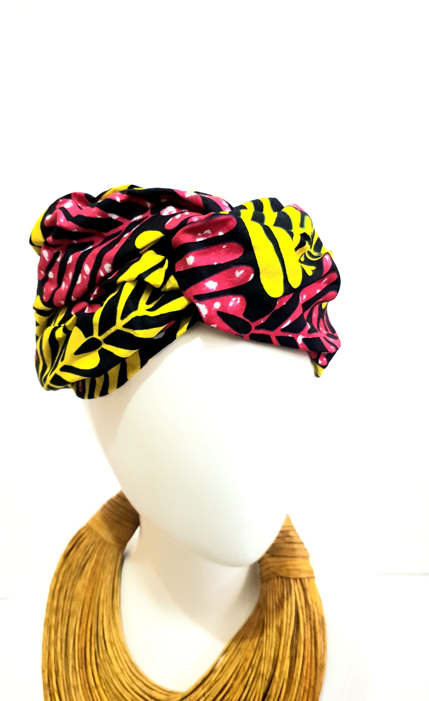 Pink and yellow African print turban style headband