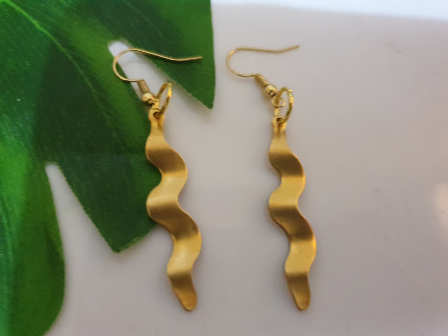Medium squiggle shaped brass Earrings
