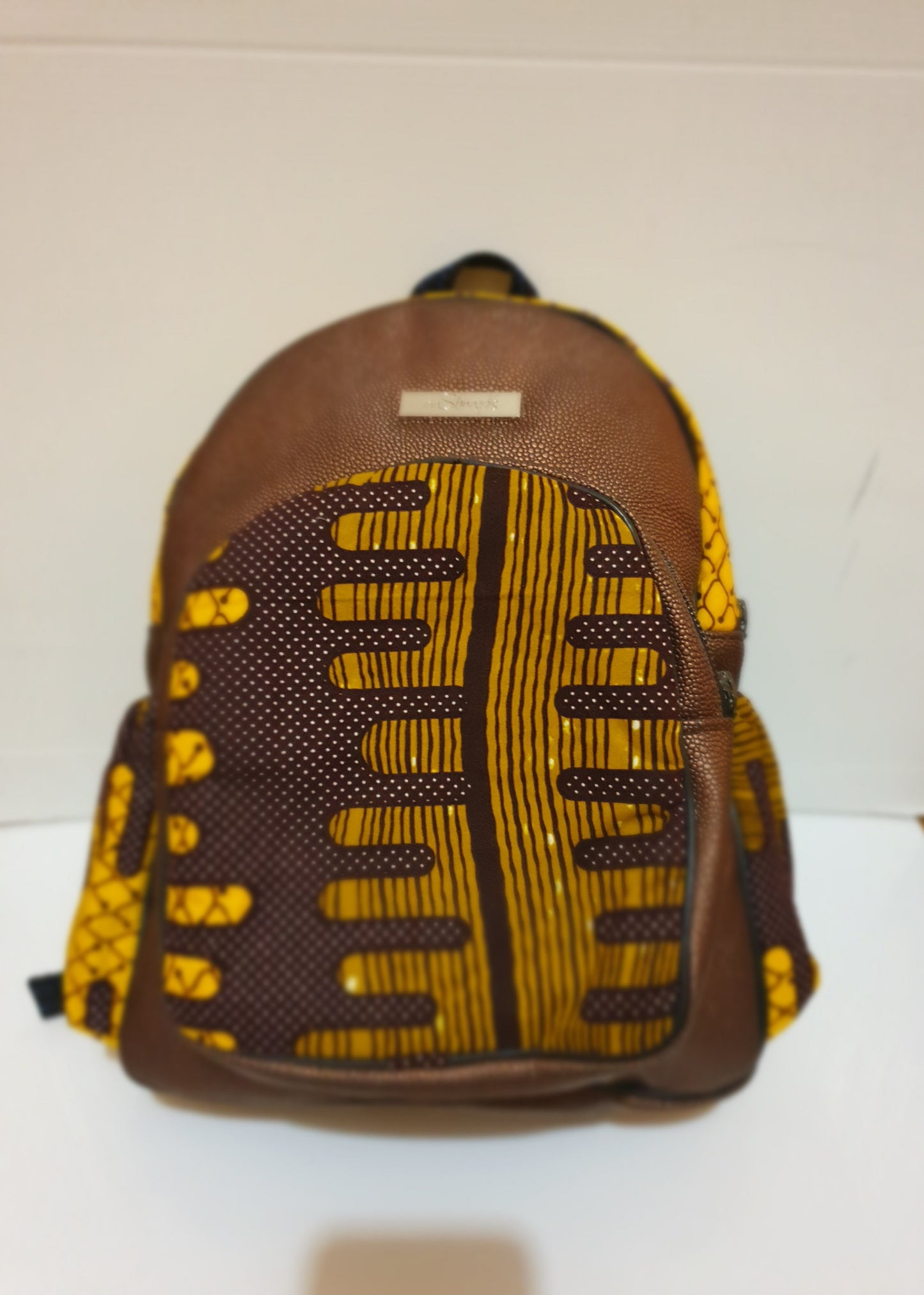 Leather and African print mini backpack - brown metallic