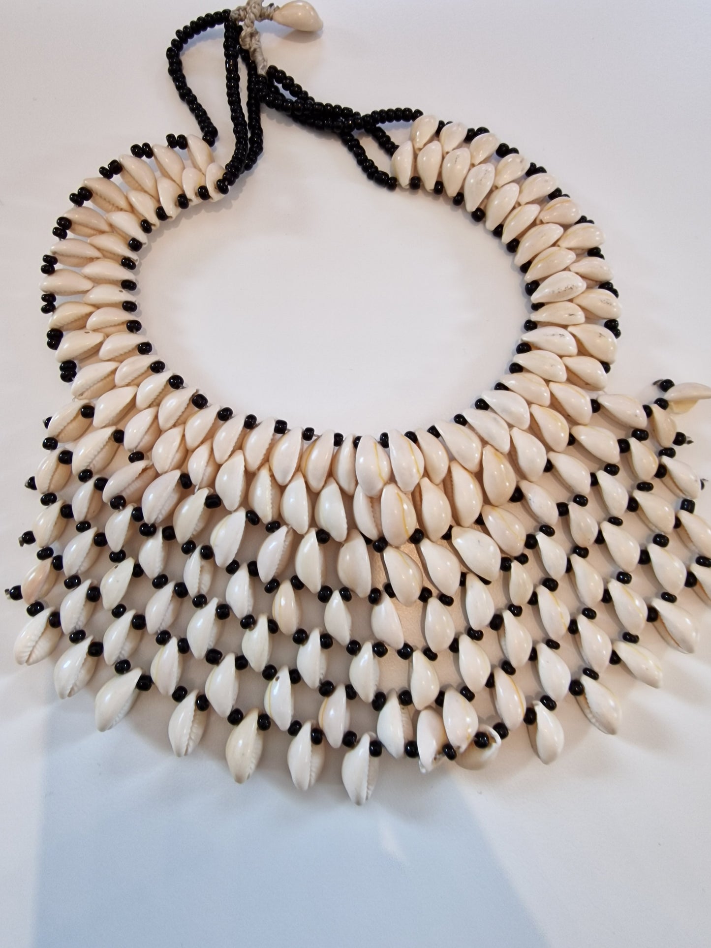 Cowrie bead statement necklace