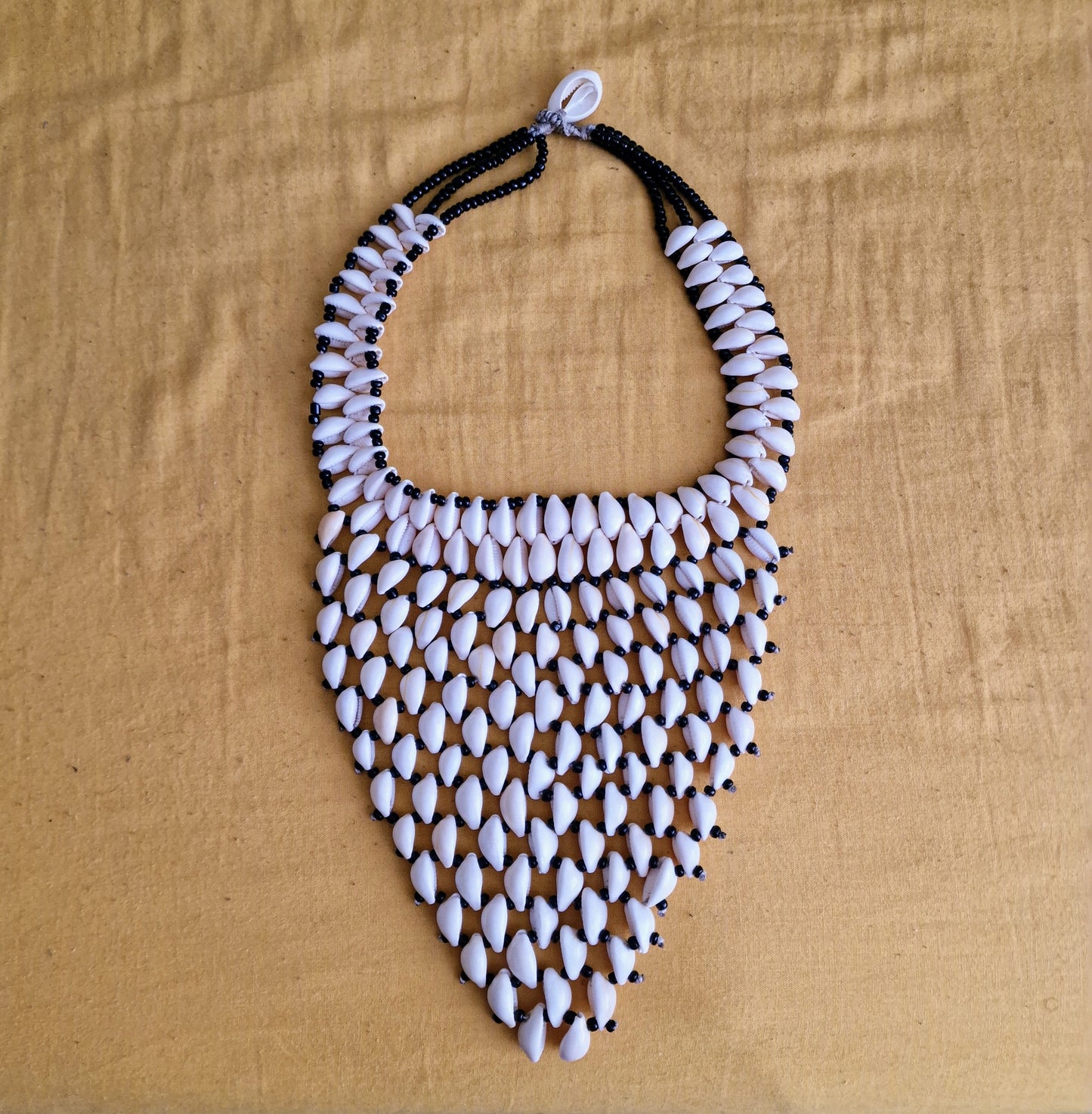 Cowrie bead statement necklace - pyramid shape