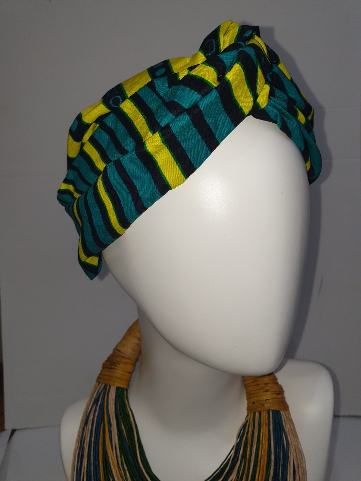 Green and yellow African print turban style headband