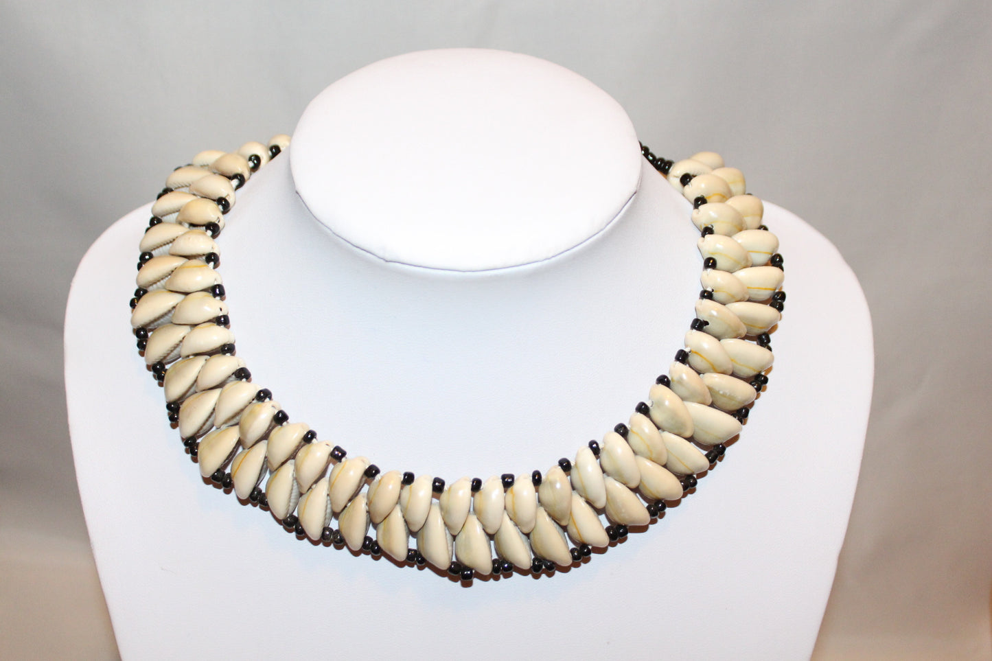 Cowrie shell bead choker necklace