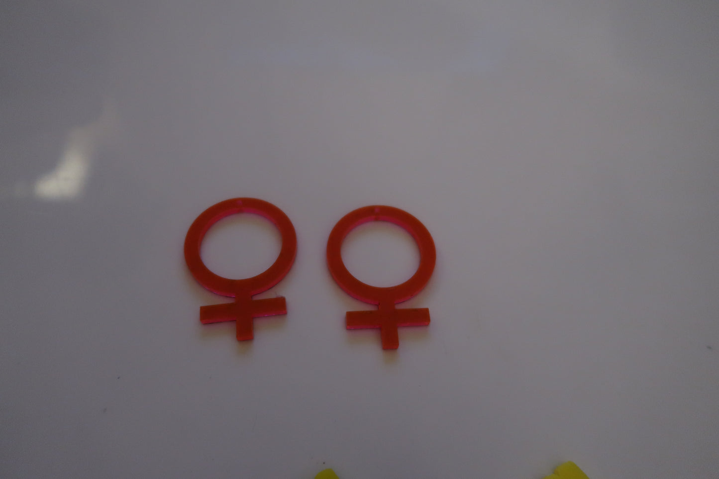 Gender equality symbol earrings