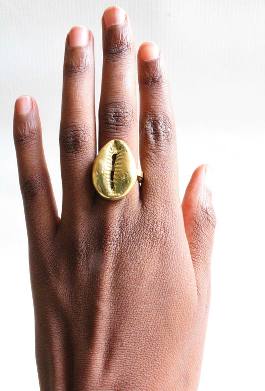 Brass cowrie shell statement ring